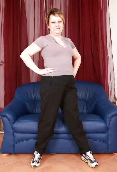 Very attractive grandma Carmen T denudes big hooters and spreads her legs 